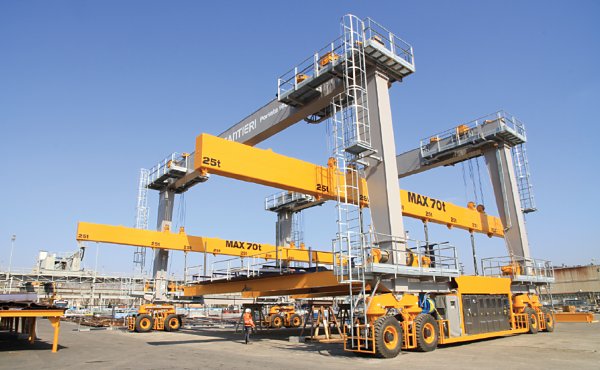 This giant mobile straddle transporter, delivered to the Fincantieri shipyard in Italy, is an example of the scope Cimolai is working with in the move to electric power.